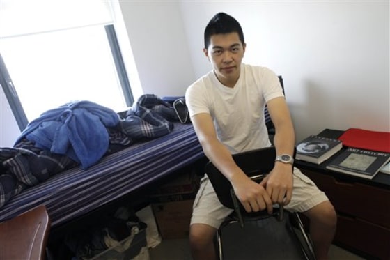 Port Lau poses in his room at Baruch College in New York. When his parents couldn't afford to send him to summer camp, Port Lau settled in for a summer at home: Eating. Sleeping. Playing video games.